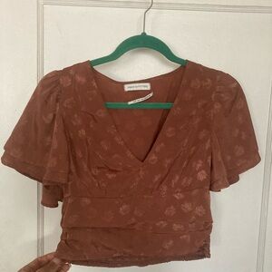 Tan silky top from Urban Outfitters